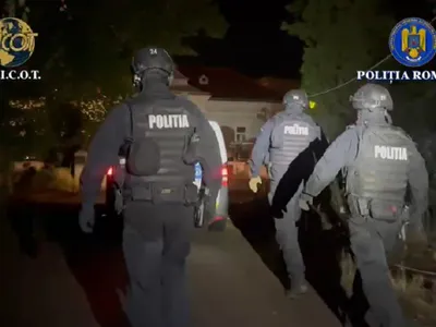 Percheziții - Foto: captură video Poliția - DIICOT