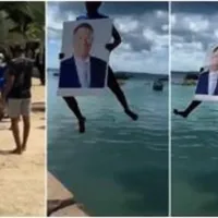Iohannis, "botezat" în Tanzania. Iată cum un localnic s-a aruncat cu președintele în apă  - Foto: Observator