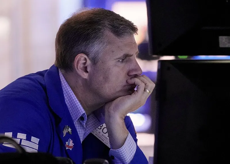 Trader, într-o zi de lucru, la New York Stock Exchange - Foto: Profimedia Images