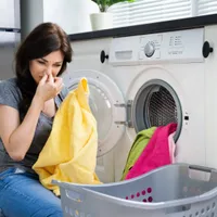 HACK-ul neștiut din mașina de spălat. Băutura care elimină mirosul neplăcut și dezinfectează hainele - Foto: Profimedia Images (imagine cu rol ilustrativ)