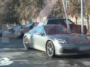 Ce influencer român a visat să ajungă în SRI și să conducă Porsche, ca în NFS, și și-a luat 911 - Foto: captură video