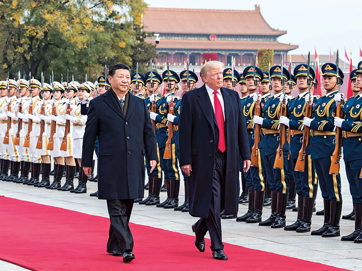 NICIO IUBIRE PIERDUTĂ La un an după alegeri, președintele american Donald Trump, aici cu președintele chinez Xi Jinping la o ceremonie de bun venit, a vizitat Beijing-ul. Lucrurile au mers în jos între cei doi lideri de atunci.
