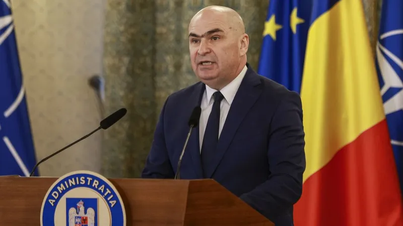 Președintele interimar Ilie Bolojan îl decorează pe Gheorghe Hagi - Foto: INQUAM PHOTOS/Cosmin Enache