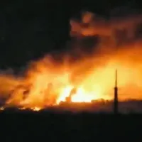 Un depozit de muniții cu tot cu blindatele rușilor, aruncat în aer în Luhansk - FOTO: Twitter/Anonymous