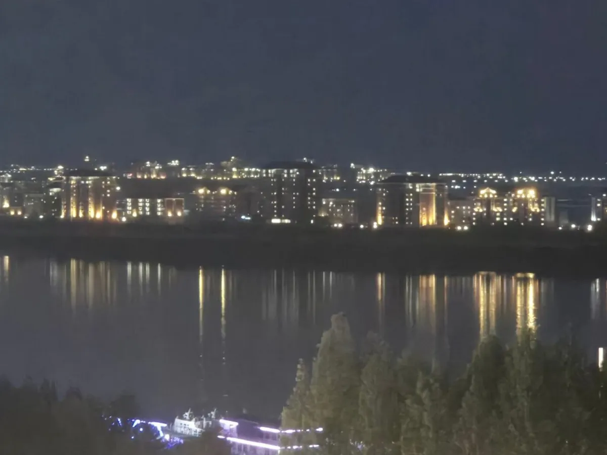Orașul Sinuiju din Coreea de Nord, văzut din China - Foto: Park Jongchol/RFA
