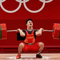 JO Tokyo: Aur și record mondial, la haltere, categoria 73 kg, pentru chinezul Shi Zhiyong. / Foto: wptv.com