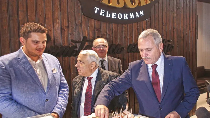 Liviu Dragnea  se înfruptă,  cu public, din bunătățile  de porc produse de fiul lui