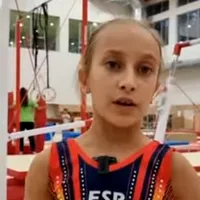 O româncă de 8 ani, campioană a Spaniei la gimnastică artistică. „Vreau să fiu ca Nadia” - Foto: captură video