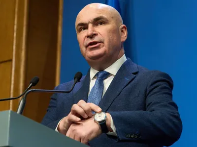 Ilie Bolojan, răspunzând unui jurnalist, în legătură cu fake news-ul privind ceasul său - Foto: Profimedia Images