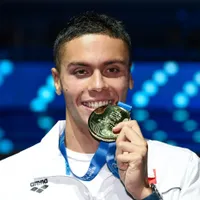 David Popovici, după aurul mondial la 200 m liber: „Apa nu minte. Îţi dă înapoi exact cât ai muncit” - Foto: Profimedia Images