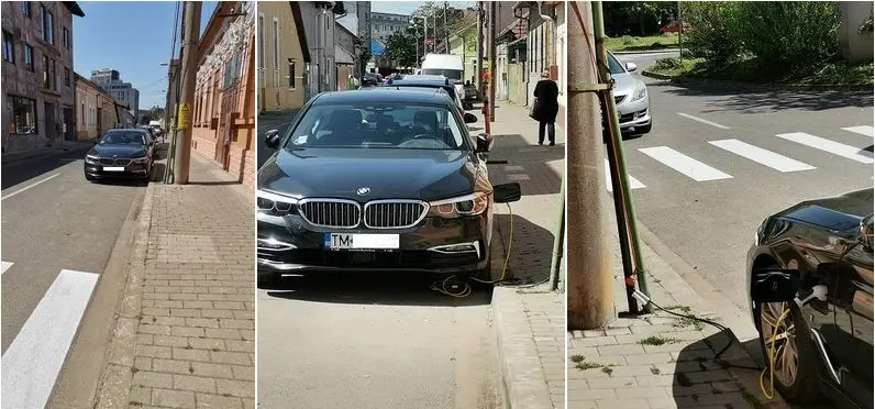 BMW încărcat cu prelungitorul tras pe stâlp / Foto: renasterea.ro