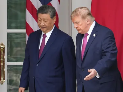 Azi, în Washington. Președintele Donald Trump (dreapta) și președintele Chinei, Xi Jinping, sosesc pentru a asista la o paradă militară. - Foto: Profimedia Images