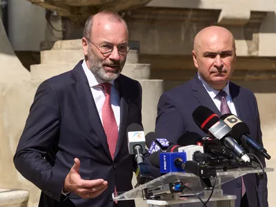 Manfred Weber și Ilie Bolojan - Foto: Profimedia Images (rol ilustrativ)