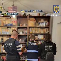 Poliția face percheziții la casa unui român acuzat de crimă organizată în Spania - Foto: Poliția DIICOT
