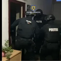 Percheziții la casele membrilor unei trupe trap Foto. captură Poliția Capitalei