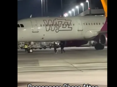 Imagini virale cu doi români care aleargă pe pista aeroportului din Koln pentru a prinde avionul spre București