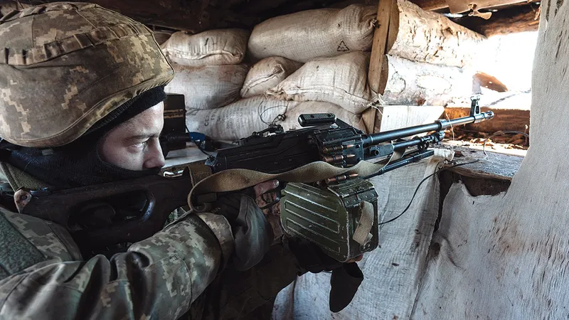 Militarii ucraineni se află deja în tranșee, pregătiţi să-și apere ţara de o invazie rusească – Foto: Getty Images