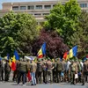 Sindicalisti ai Federatiei Silva protesteaza in fata Guvernului impotriva reorganizarii Romsilva - Foto:INQUAM PHOTOS / Vlad Bereholschi