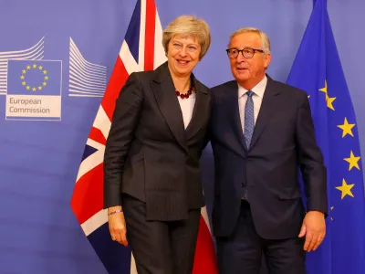 Theresa May cu Jean-Claude Juncker, președinte al Comisiei Europene. FOTO: Facebook UK Prime Minister