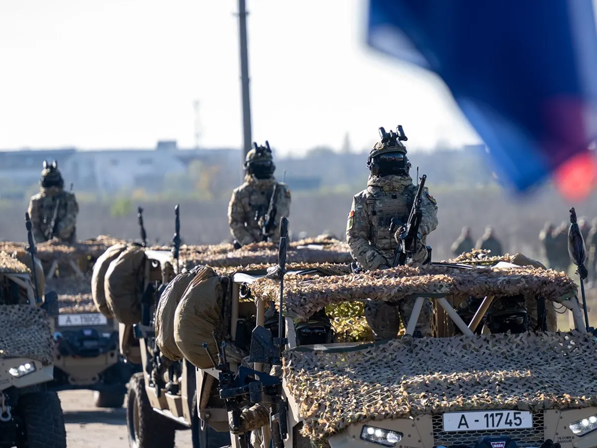 Militarii din cadrul grupului de luptă NATO din România participă la parada de 1 Decembrie