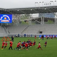 Peste 300 de copii au înfruntat ploaia la prima aniversare a Zilei Naționale a Rugby-ului Foto: NWR