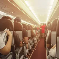 Motivul banal pentru care o pasagera a fost la un pas de a fi dată afară din avion. Ce a făcut? - Foto: Profimedia / imagine rol ilustrativ