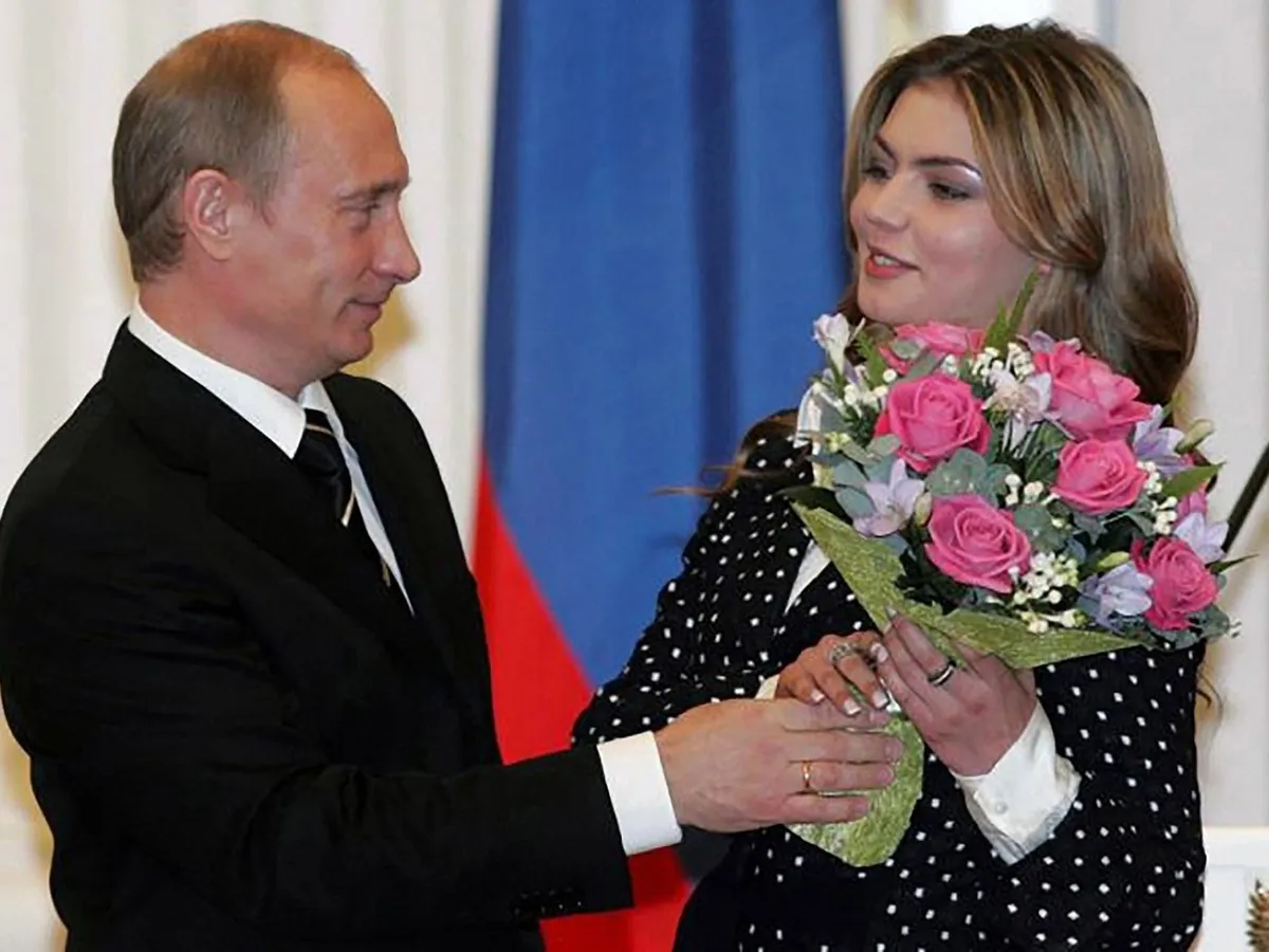Vladimir Putin și Alina Kabaeva, mama celor doi băieți al liderului Rusiei - Foto: Profimedia Images