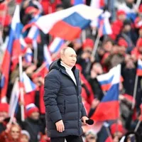Putin a urcat pe scena mitingului de propagandă de la Moscova în geacă Loro Piana, de 12.000 €. / Foto: Kremlin.ru