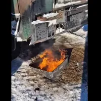 Cum pornește „mândrețea” de camion militar românesc DAC iarna la -20 grade? Faci focul sub el - Foto: captură video