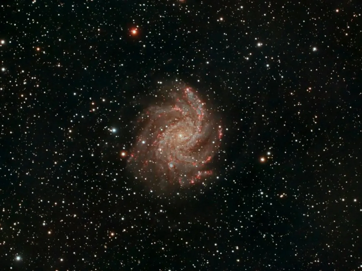 Imagine prin telescop a galaxiei NGC 6946 - Foto: Pexels/Daniel Cid