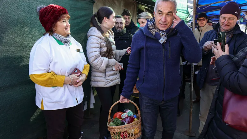 Călin Georgescu a purtat geacă de Mufflon de 1.200 lei, la piață să își ia produse tradiționale - Foto: INQUAM PHOTOS / Octav Ganea