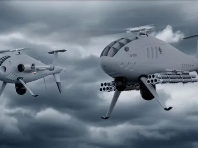 Producătorii extind gama de elicoptere-drone cu variante înarmate. Pot lansa și 10 rachete - FOTO Schiebel