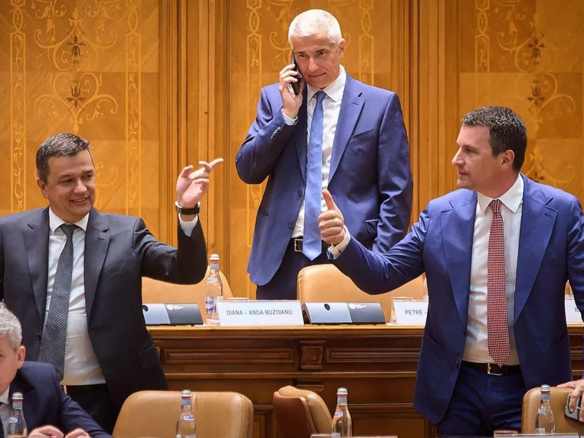 Preşedintele Camerei Deputaţilor, Sorin Grindeanu, şi vicepremierul Tanczos Barna discută în contradictoriu, sub ochii ministrului Justiţiei,  Radu Marinescu - Foto: Profimedia Images