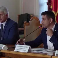 VIDEO Teodorovici, finanțistul lui Dăncilă, la masă cu George Simion. E specialistul AUR în energie