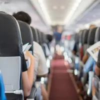 Motivul pentru care o femeie a fost filmată în timp ce dormea în avion, în compartimentul de bagaje - Foto: Profiemdia / imagine rol ilustrativ