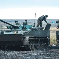 Tanchiștii ruși la un exercițiu militar în regiunea Rostov, la câțiva kilometri de granița Ucrainei - Foto: Getty Images