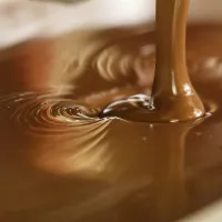 Doi muncitori au căzut în cuva cu cciocolată a fabricii. Uzina a fost amendată de autorităţi - Foto: Flickr/The Barry Callebaut Group