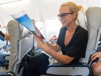 Femeie în avion - Foto: FB