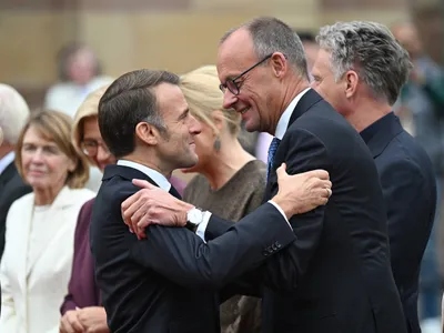 Emmanuel Macron și Friedrich Merz - Foto: Profimedia Images