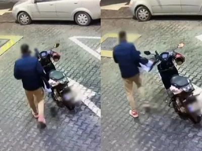 Momentul în care un bărbat fură telefonul unui livrator  - Foto: captură imagini camera de supraveghere