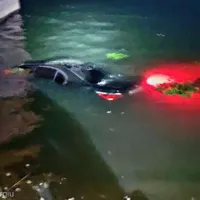 BMW, transformat în „submarin” pe fundul lacului Mihăilești. / Foto: ISU Giurgiu