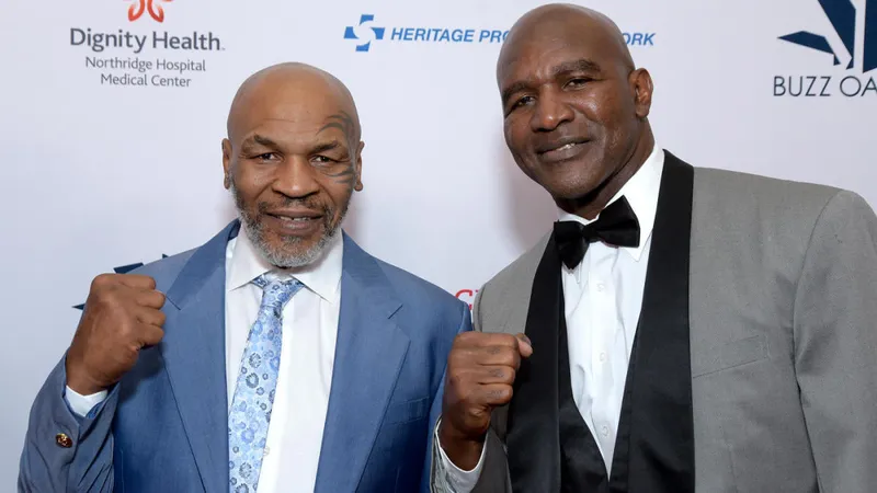 Boxerul american Mike Tyson a anunţat că că îl va înfrunta pe compatriotul său Evander Holyfield în data de 29 mai, la aproape un sfert de secol de la precedentul lor duel. / Foto: cbssports.com